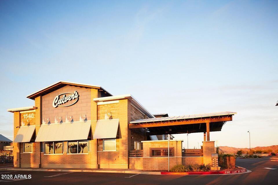20719 West Hamilton Street Buckeye, AZ 85396 - Photo 99 of 100 a view of a large building with a view of a street