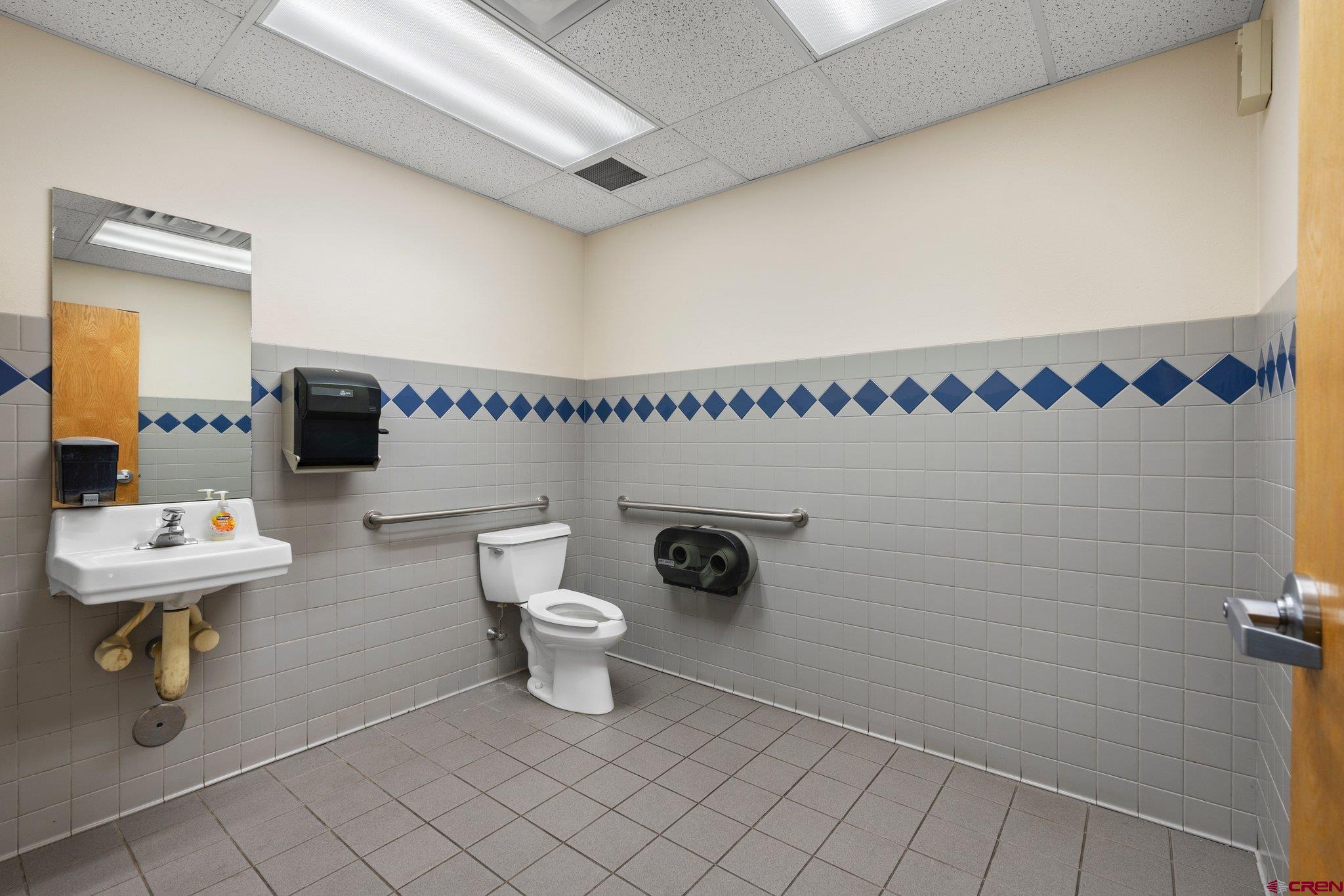 329 South Camino Del Rio Durango, CO 81303 - Photo 21 of 29 a bathroom with a toilet and a shower