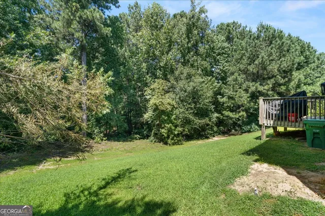 a view of a garden with a tree