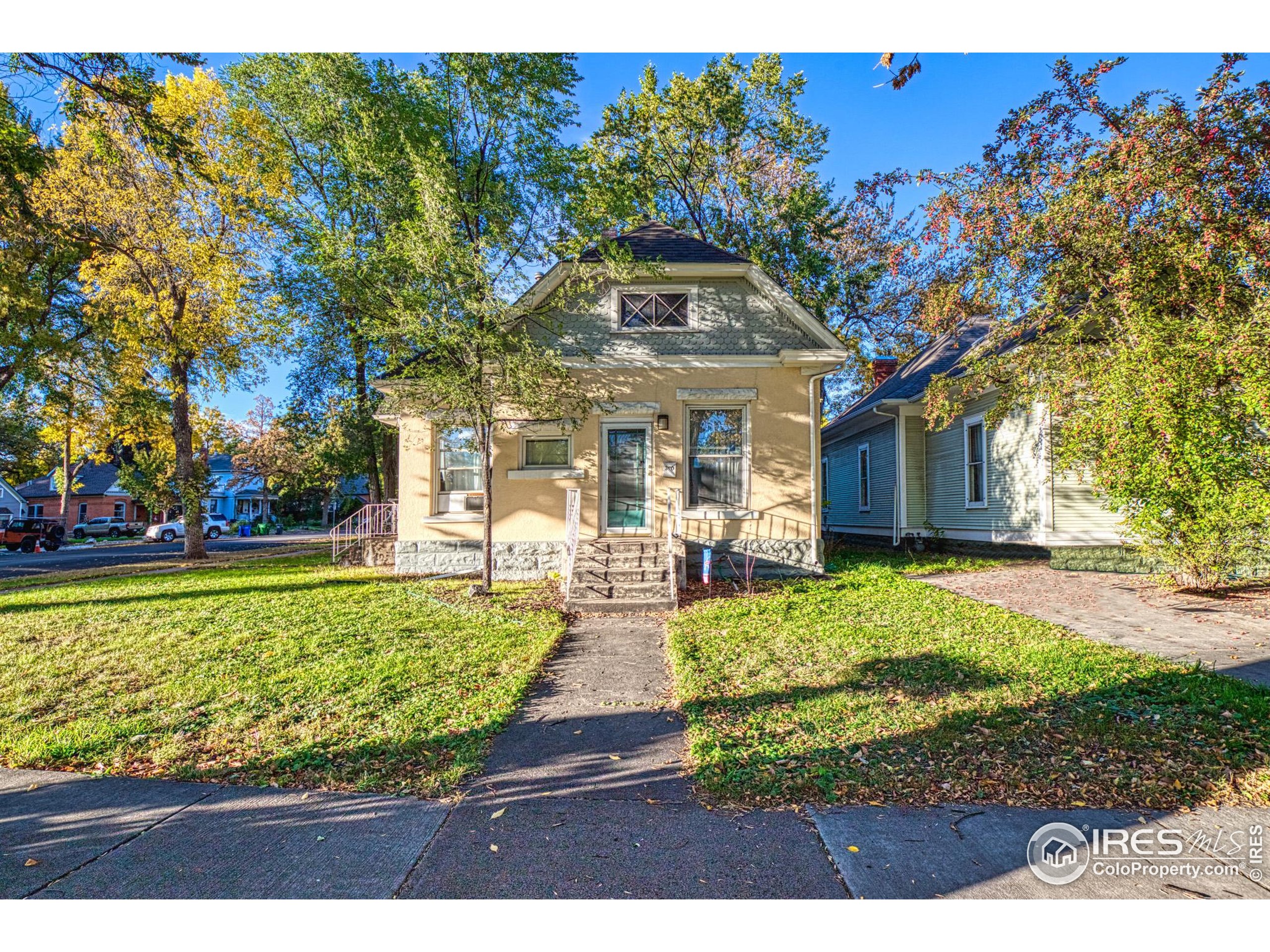 530 Mathews Street Fort Collins, CO 80524 - Photo 1 of 34 a front view of a house with garden