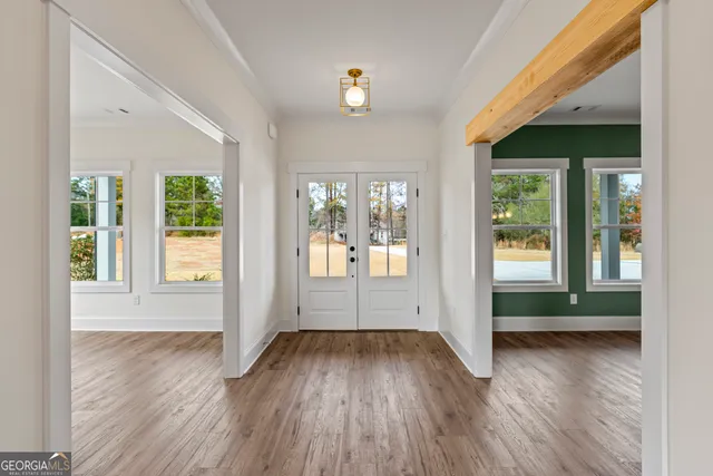 a living room with a fireplace and a fireplace
