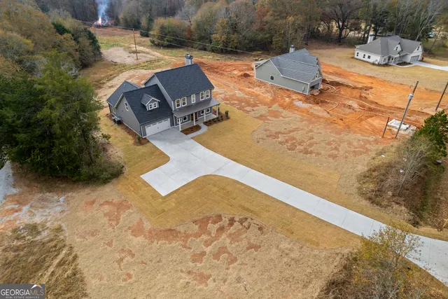 a view of swimming pool with outdoor seating