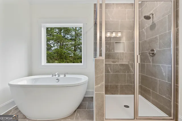 a house with swimming pool in front of it