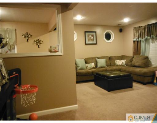 61 Glenville Road Edison, NJ 08817 - Photo 5 of 10 a living room with furniture