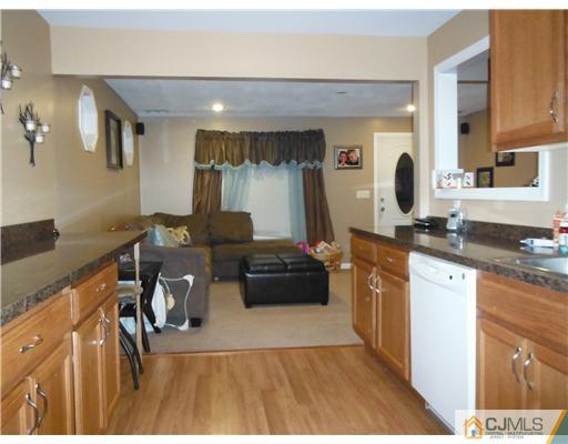 61 Glenville Road Edison, NJ 08817 - Photo 7 of 10 a living room with furniture and a wooden floor