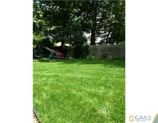 61 Glenville Road Edison, NJ 08817 - Photo 10 of 10 a view of a garden