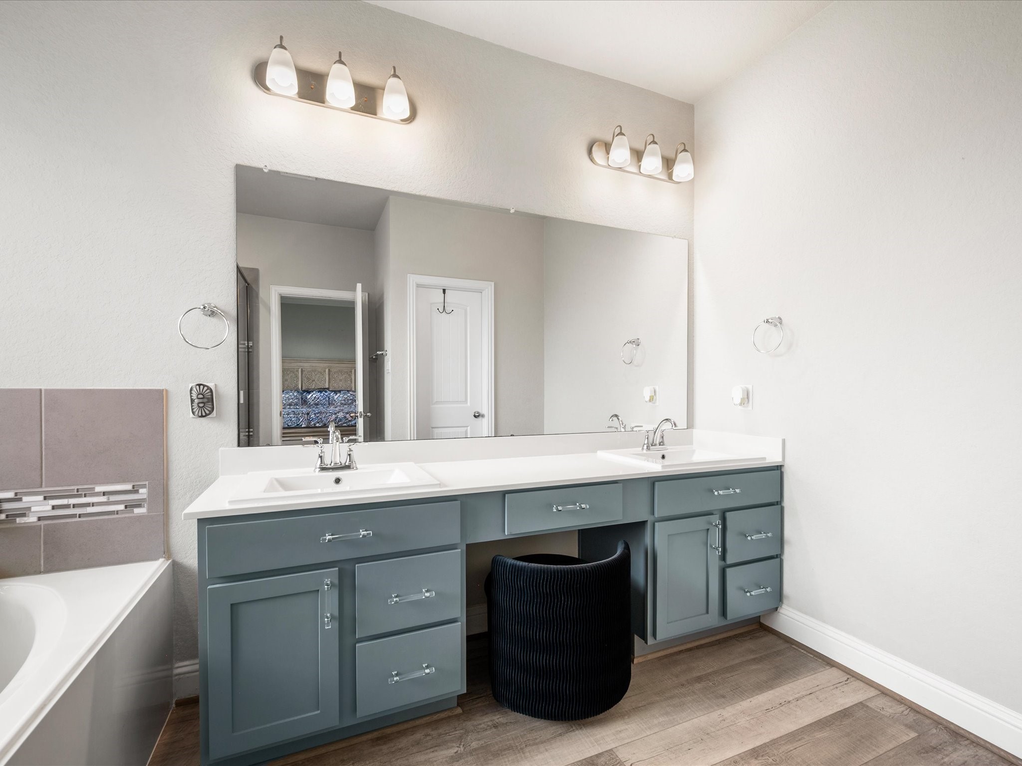 7123 Poppyseed Trail Spring, TX 77379 - Photo 15 of 30 Dual sinks and dedicated vanity space make busy mornings a little easier while providing plenty of room to get ready.