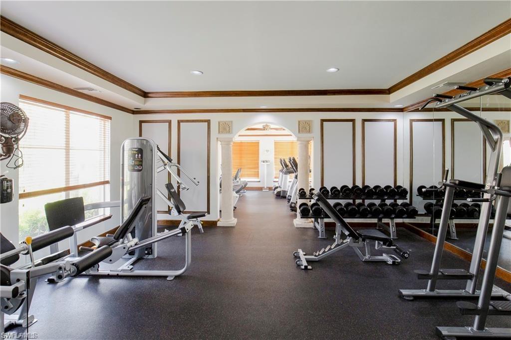 1180 Reserve Way, Unit 206 Naples, FL 34105 - Photo 13 of 18 a view of a room with gym equipment