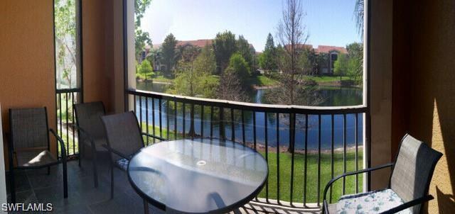 1180 Reserve Way, Unit 206 Naples, FL 34105 - Photo 10 of 18 a view of a balcony with chair