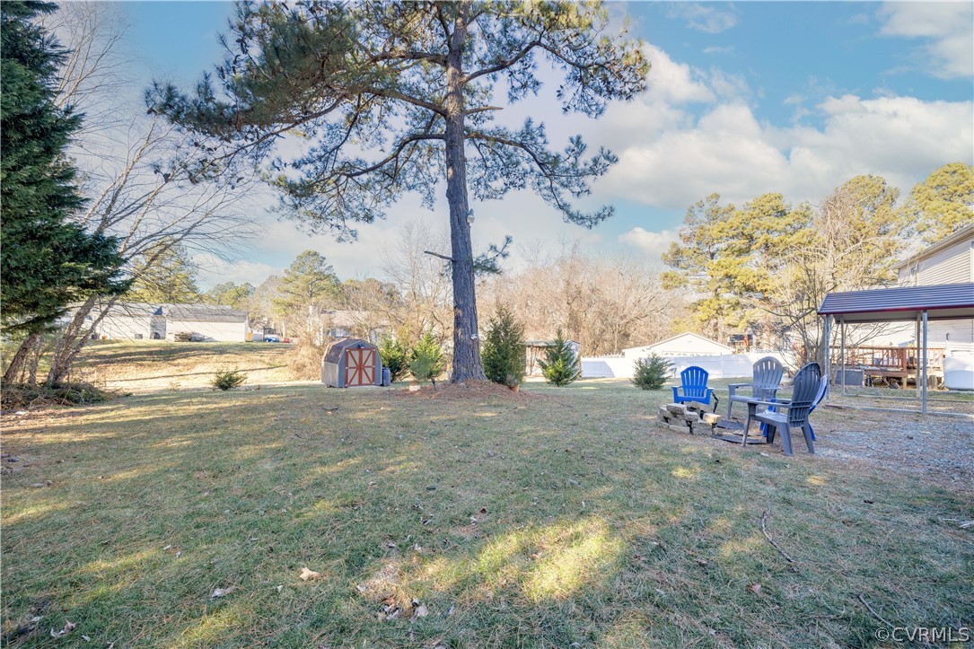 5206 South Jessup Road Chesterfield, VA 23832 - Photo 20 of 23 a view of a yard with a tree