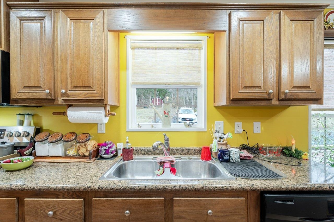 523 Gravels Road Harrisonburg, VA 22802 - Photo 16 of 65 a kitchen with granite countertop cabinets and window