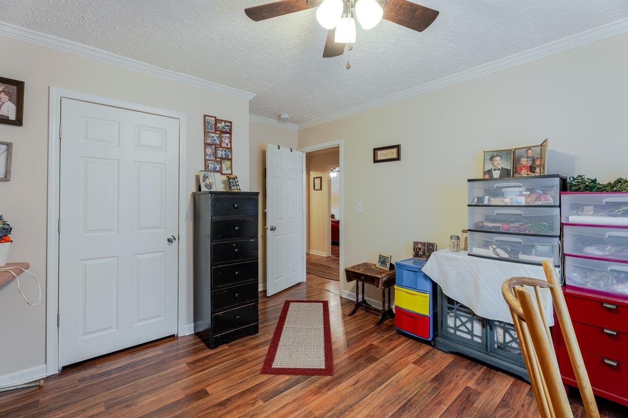 523 Gravels Road Harrisonburg, VA 22802 - Photo 28 of 65 a living room with furniture and a wooden floor