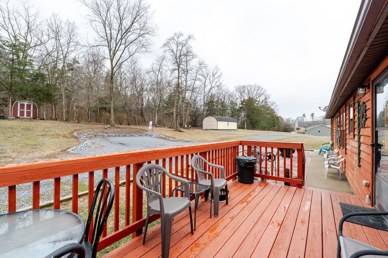 523 Gravels Road Harrisonburg, VA 22802 - Photo 49 of 65 a balcony with wooden floor and outdoor seating