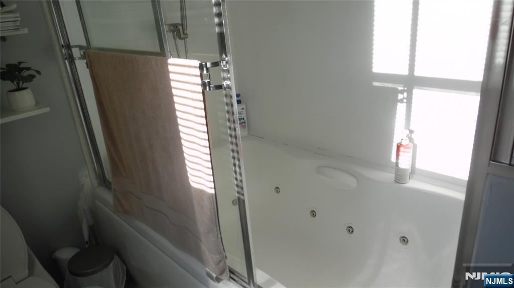 26 James Terrace Pompton Lakes, NJ 07442 - Photo 15 of 43 a bathroom with a bathtub and shower