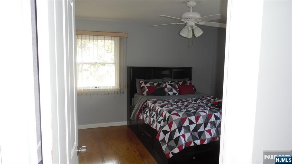 26 James Terrace Pompton Lakes, NJ 07442 - Photo 19 of 43 a bedroom with a bed and a window
