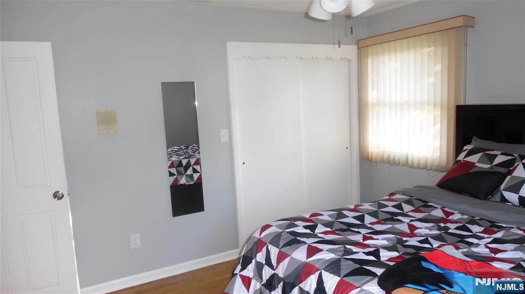 26 James Terrace Pompton Lakes, NJ 07442 - Photo 20 of 43 a bedroom with a bed and a window