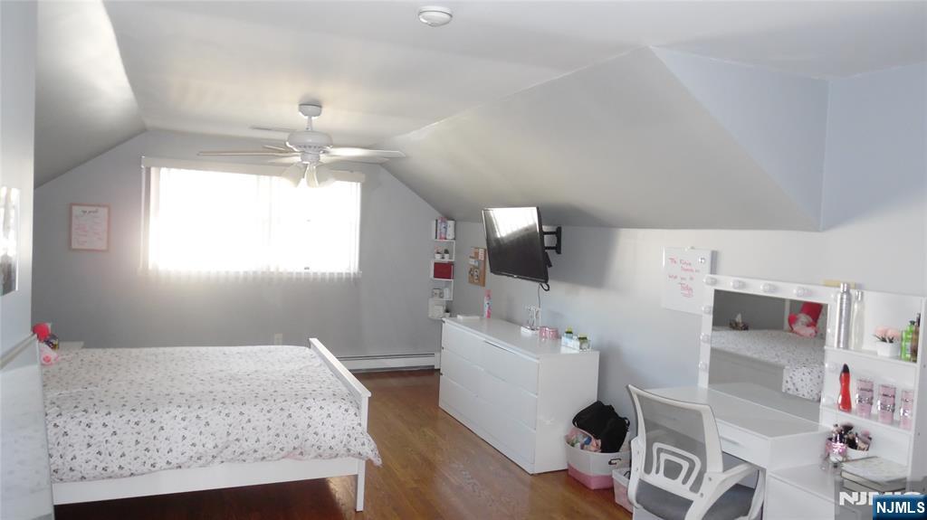 26 James Terrace Pompton Lakes, NJ 07442 - Photo 21 of 43 a bedroom with a bed and window