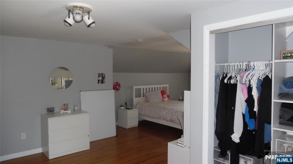 26 James Terrace Pompton Lakes, NJ 07442 - Photo 23 of 43 a view of walk in closet with clothes and shoes