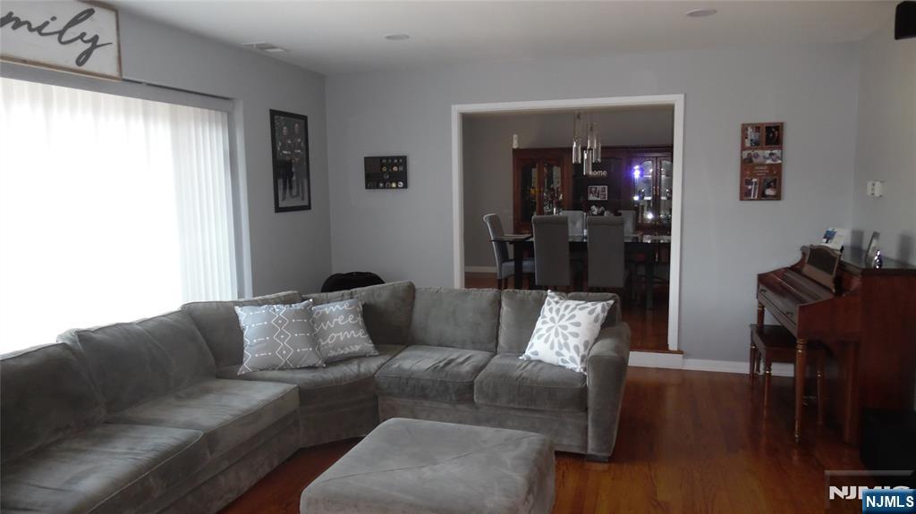 26 James Terrace Pompton Lakes, NJ 07442 - Photo 4 of 43 a living room with furniture and a window