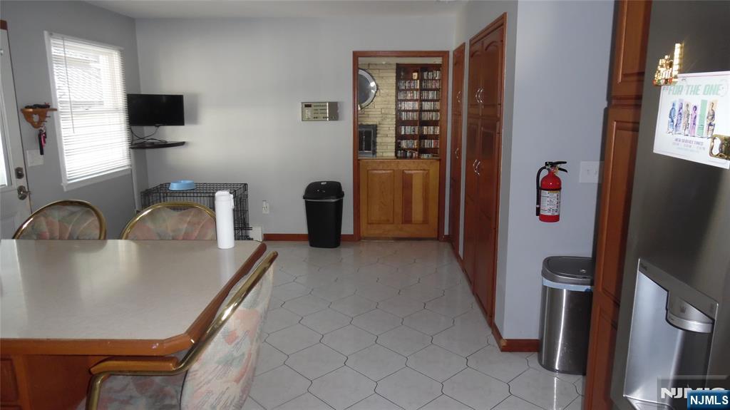 26 James Terrace Pompton Lakes, NJ 07442 - Photo 9 of 43 a view of kitchen with furniture and refrigerator