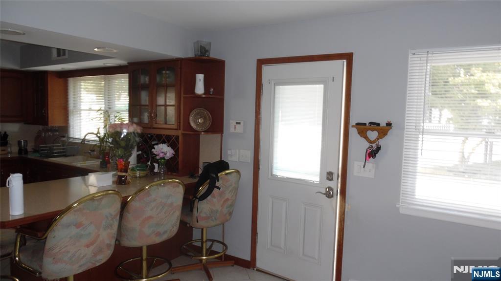 26 James Terrace Pompton Lakes, NJ 07442 - Photo 10 of 43 a view of a livingroom with furniture and windows
