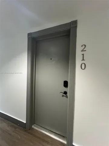 a bathroom with a glass door