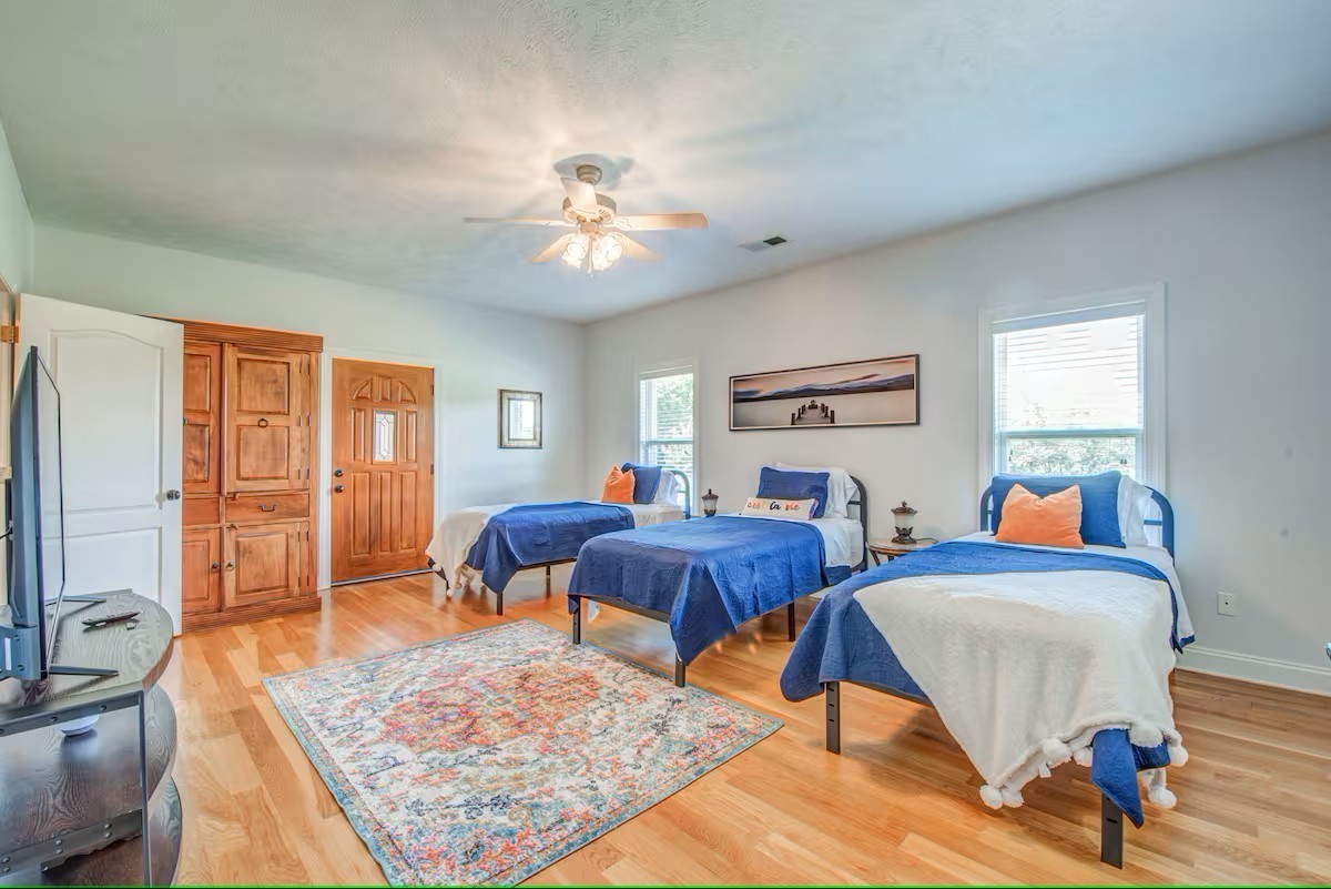 1215 Beaver Creek Road Mason, TN 38049 - Photo 34 of 74 a bedroom with furniture and a rug