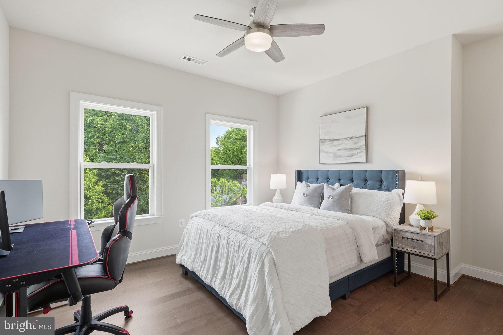 7821 Old Falls Road McLean, VA 22102 - Photo 36 of 62 a bedroom with a bed window and a desk