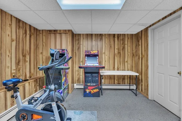 a children room with furniture and a window