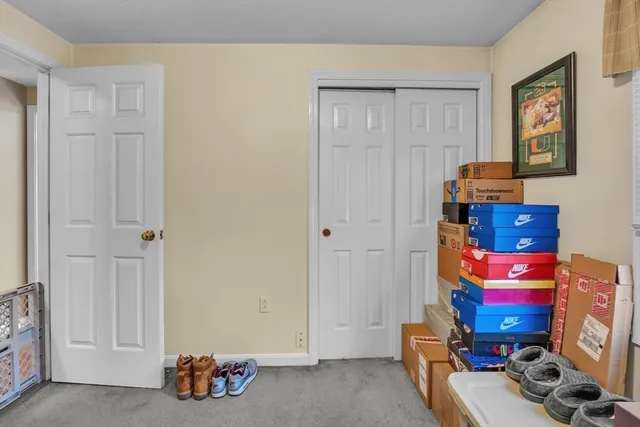 a room with toys and dresser