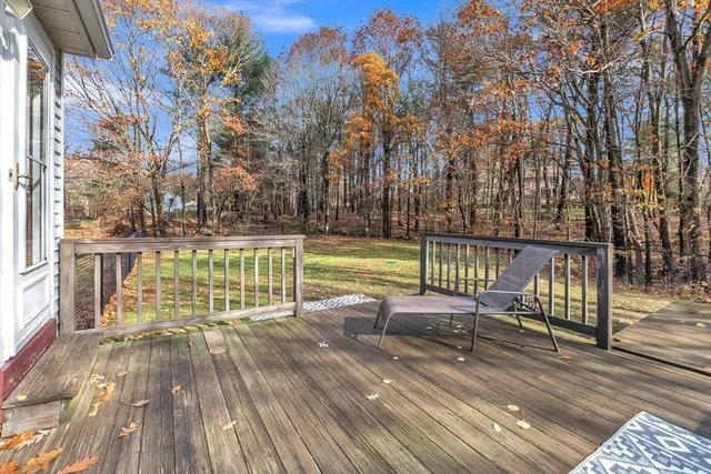 a view of a chairs and table on the wooden floor