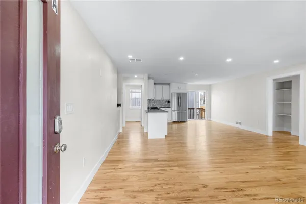 a view of kitchen dining table and cabinets