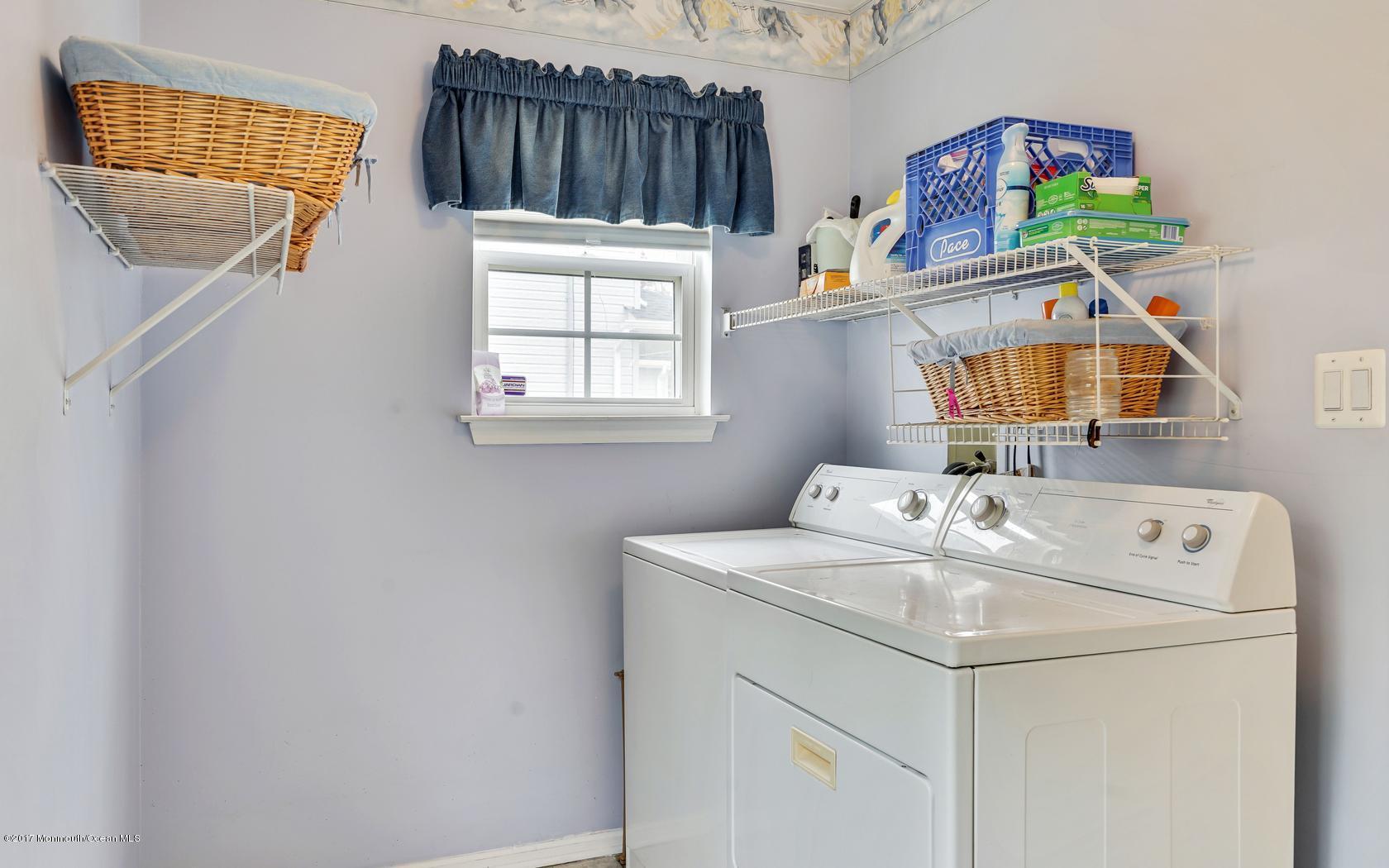 133 Bowsprit Road Manahawkin, NJ 08050 - Photo 30 of 32 a utility room with dryer and washer