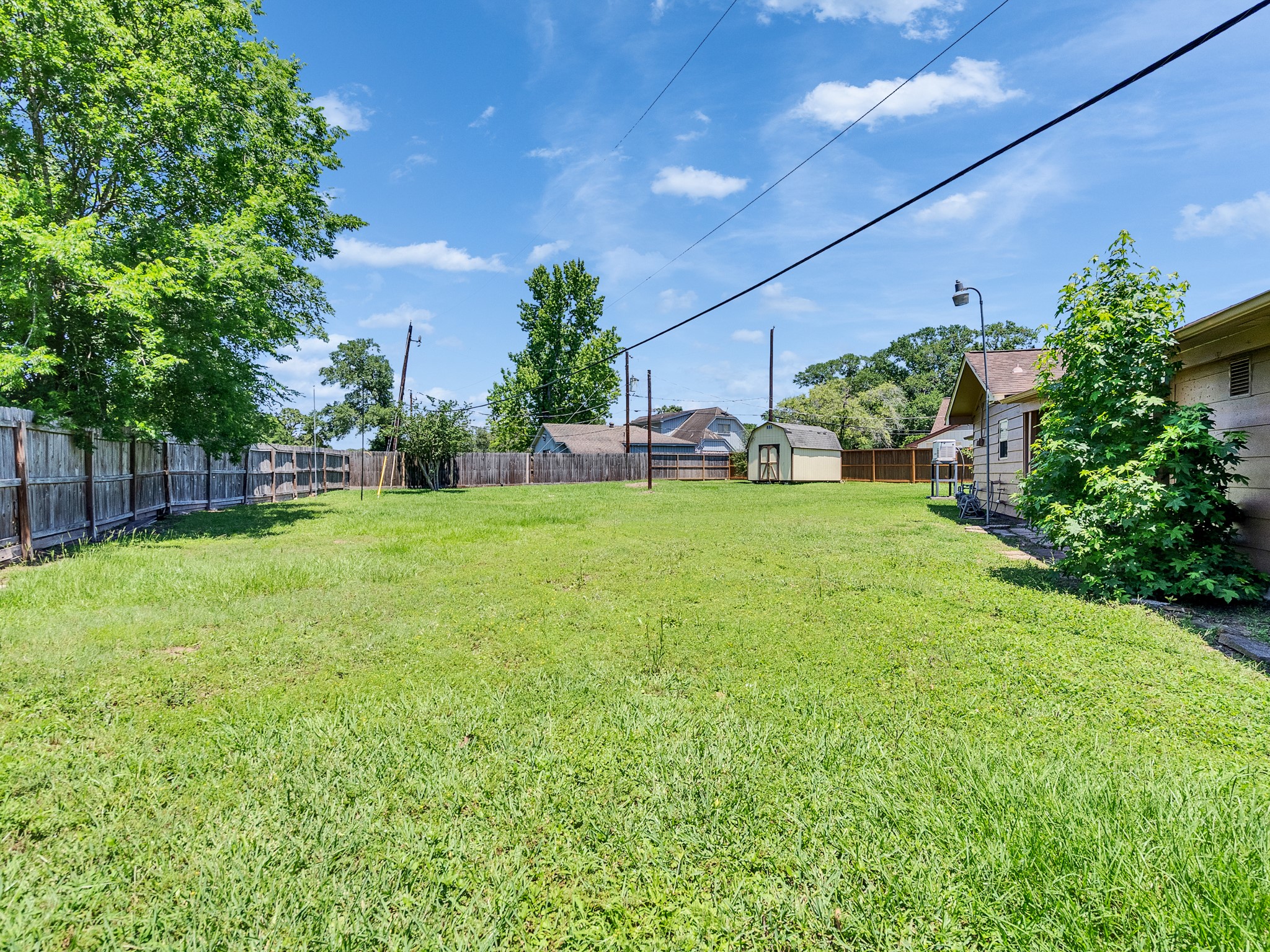 603 Casper Court Spring, TX 77373 - Photo 27 of 31 Another view of the length of this big back yard
