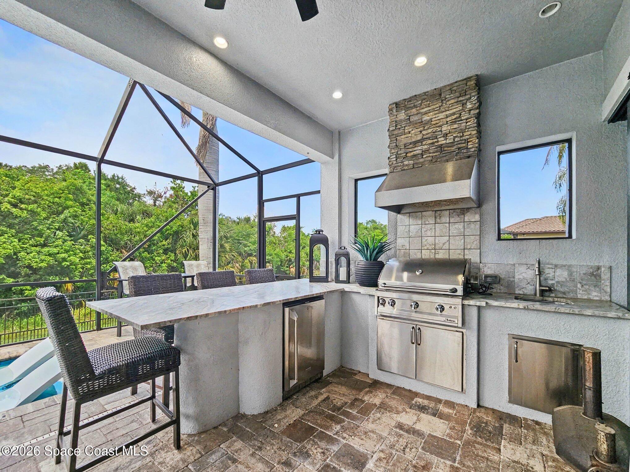 5008 Duson Way Rockledge, FL 32955 - Photo 28 of 54 Outdoor Kitchen Upgraded