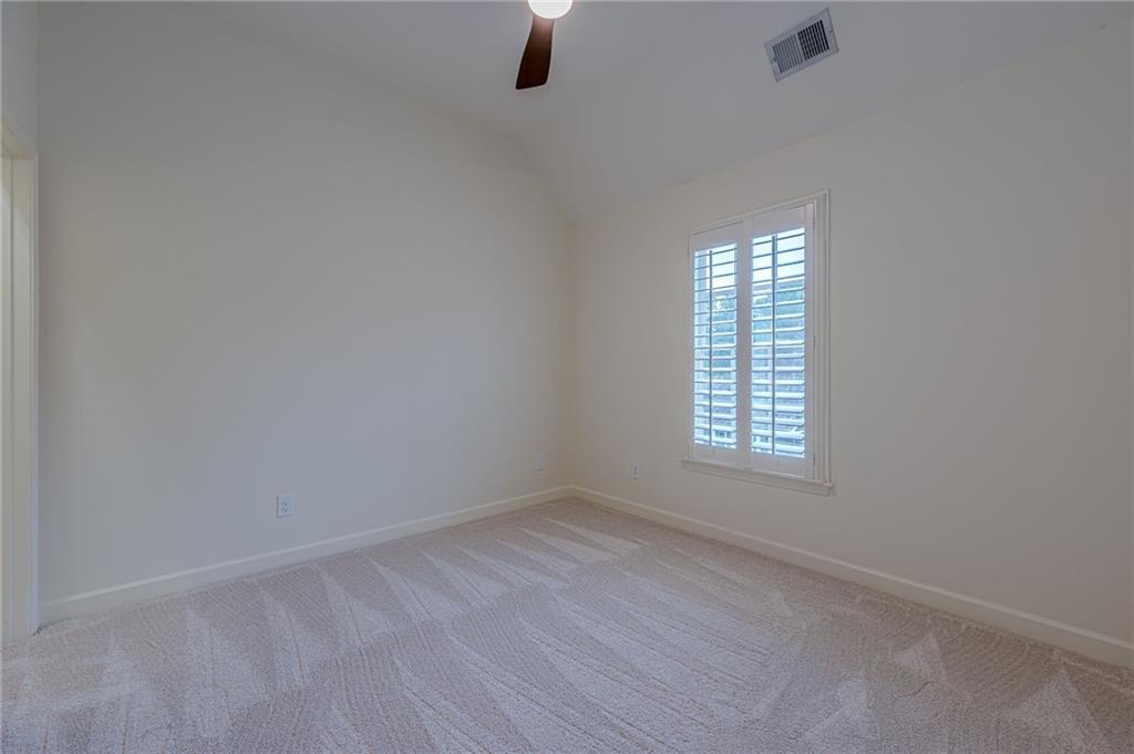 247 Fowler Street Woodstock, GA 30188 - Photo 28 of 72 an empty room with a window