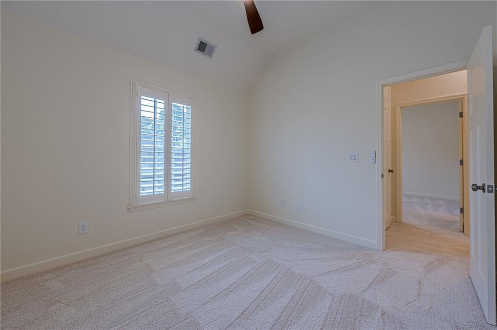 247 Fowler Street Woodstock, GA 30188 - Photo 30 of 72 an empty room with windows and entrance