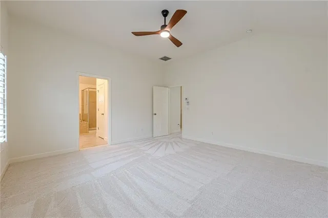 a view of a building with a garden and plants