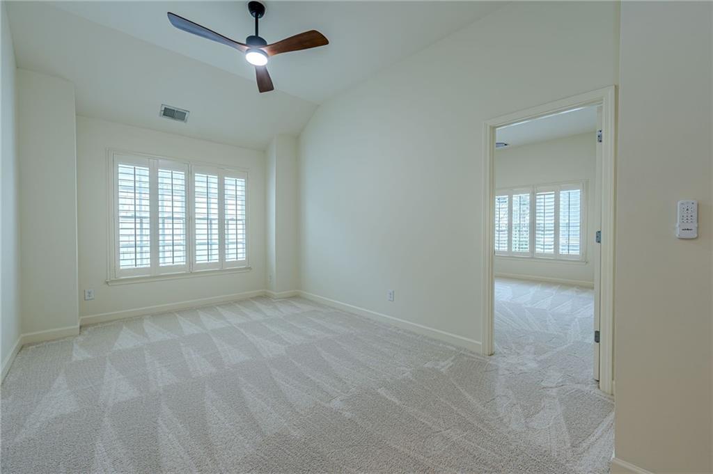 247 Fowler Street Woodstock, GA 30188 - Photo 41 of 72 a view of an empty room with a window