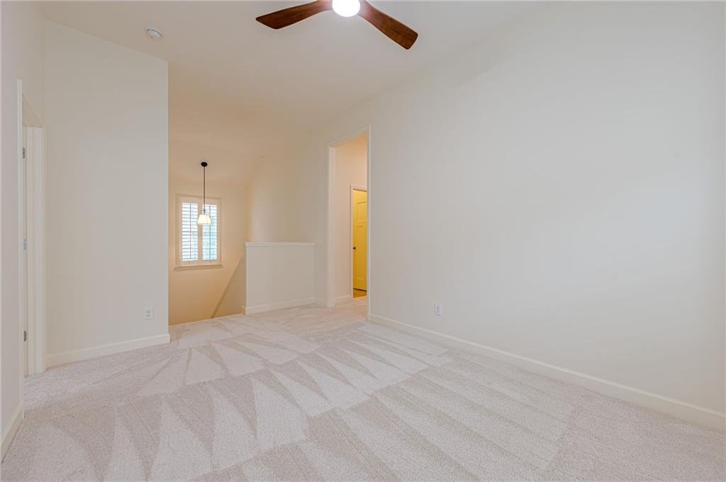 247 Fowler Street Woodstock, GA 30188 - Photo 43 of 72 a view of an empty room with a window