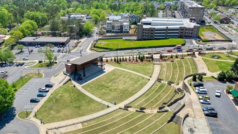 247 Fowler Street Woodstock, GA 30188 - Photo 62 of 72 an aerial view of a house with a swimming pool