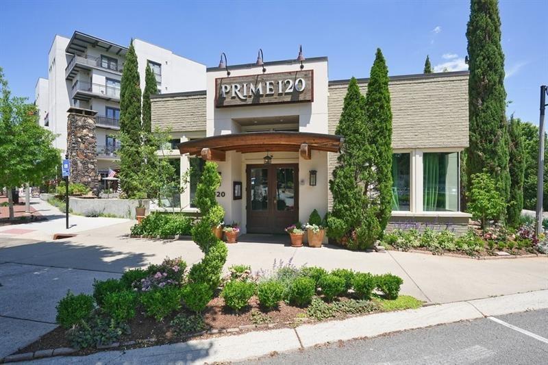 247 Fowler Street Woodstock, GA 30188 - Photo 66 of 72 a view of a building with a garden and plants
