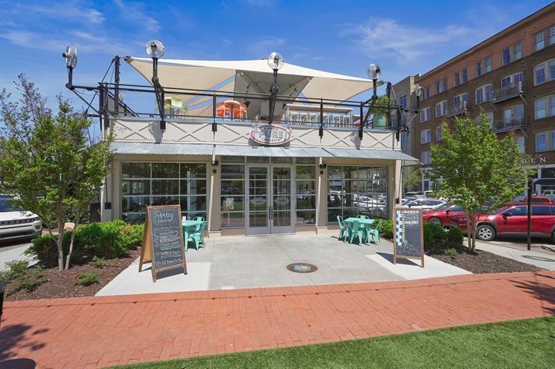 247 Fowler Street Woodstock, GA 30188 - Photo 72 of 72 a front view of a house with a patio