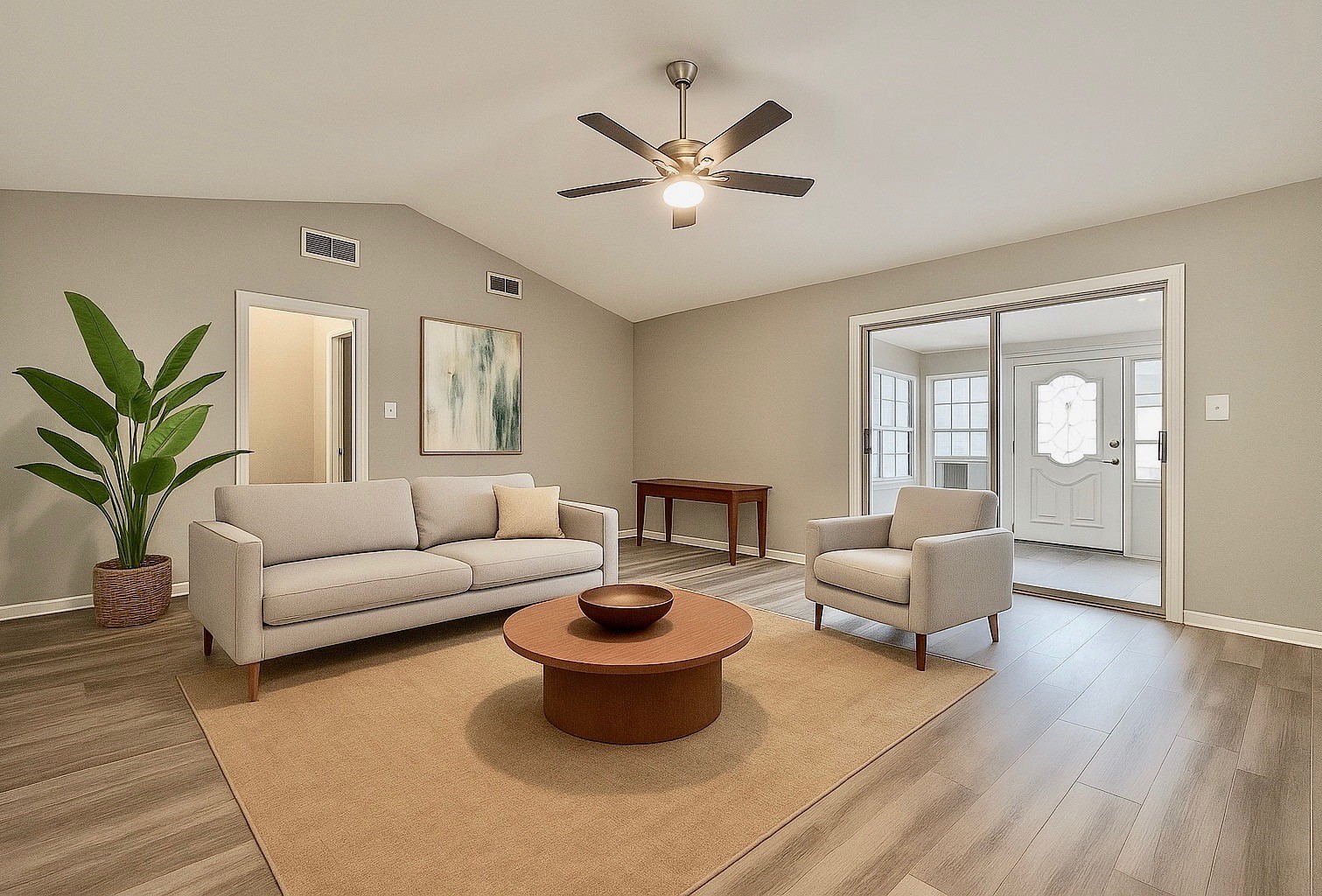 2101 Roland Rue Street Pearland, TX 77581 - Photo 2 of 12 a living room with furniture a chandelier and a potted plant