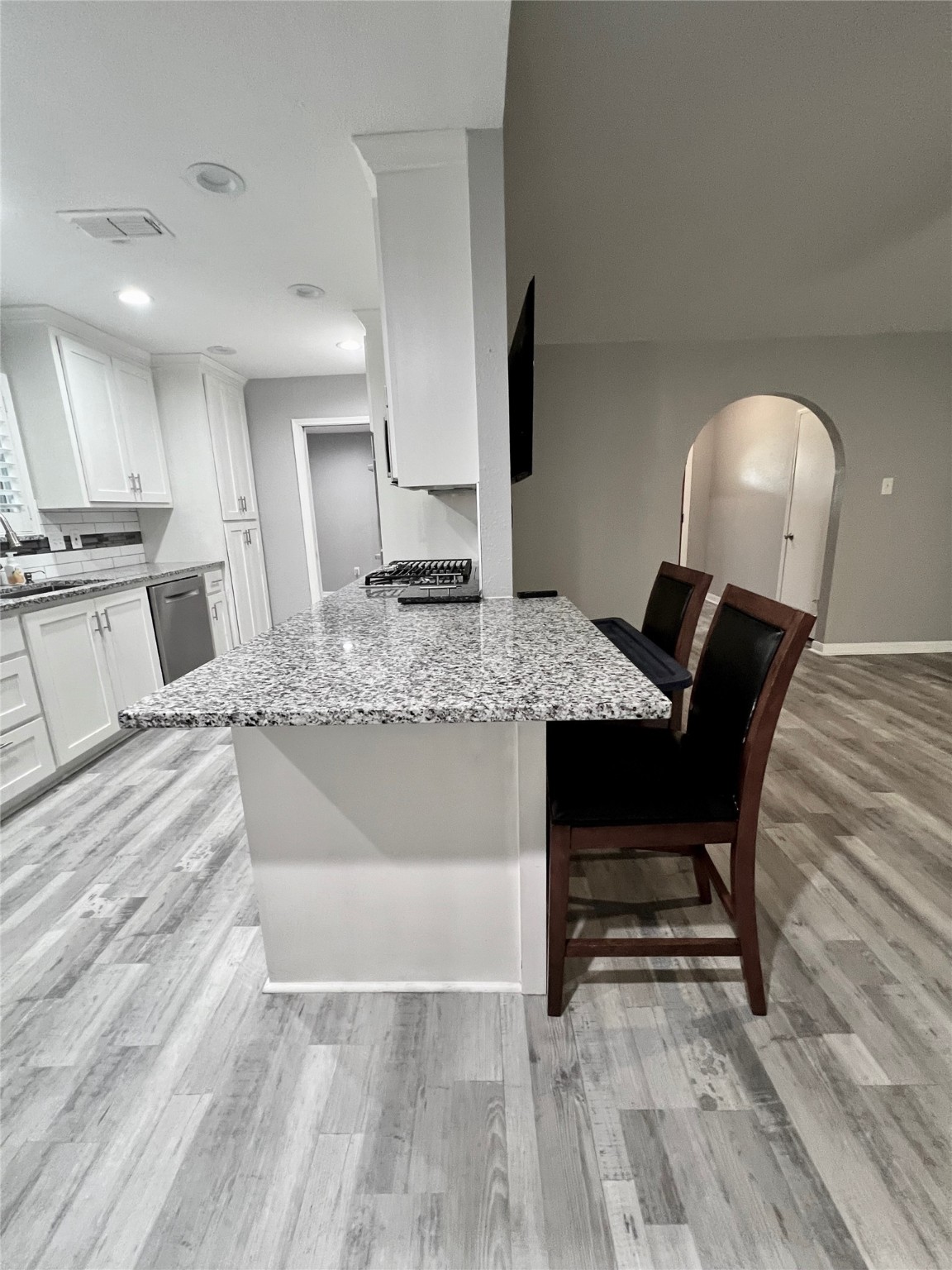 2101 Roland Rue Street Pearland, TX 77581 - Photo 8 of 12 a view of kitchen with sink dining table and chairs