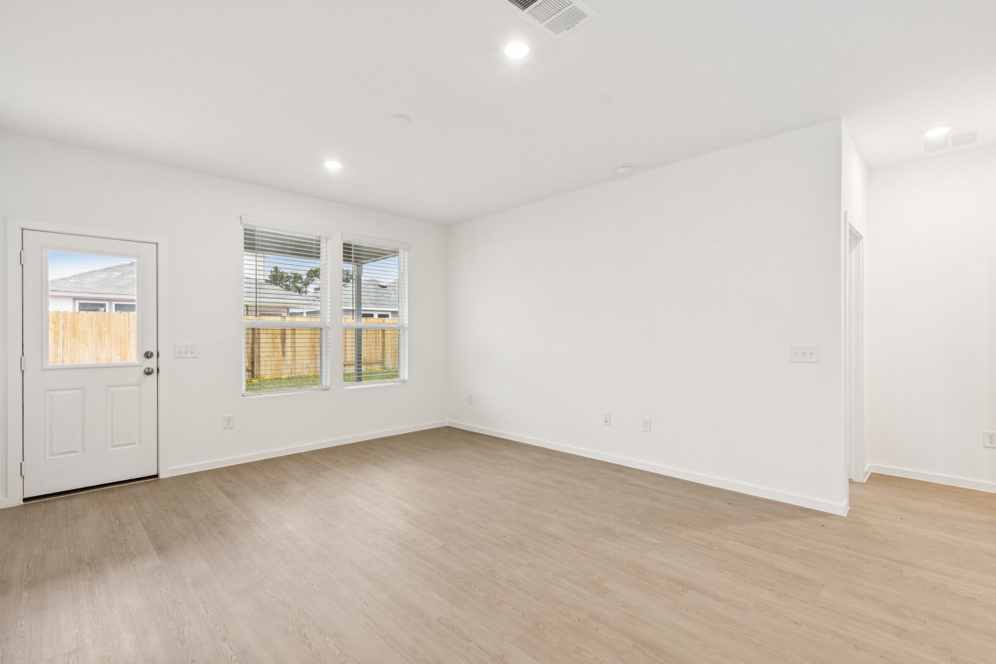26279 Arrowleaf Drive Magnolia, TX 77355 - Photo 12 of 35 an empty room with windows