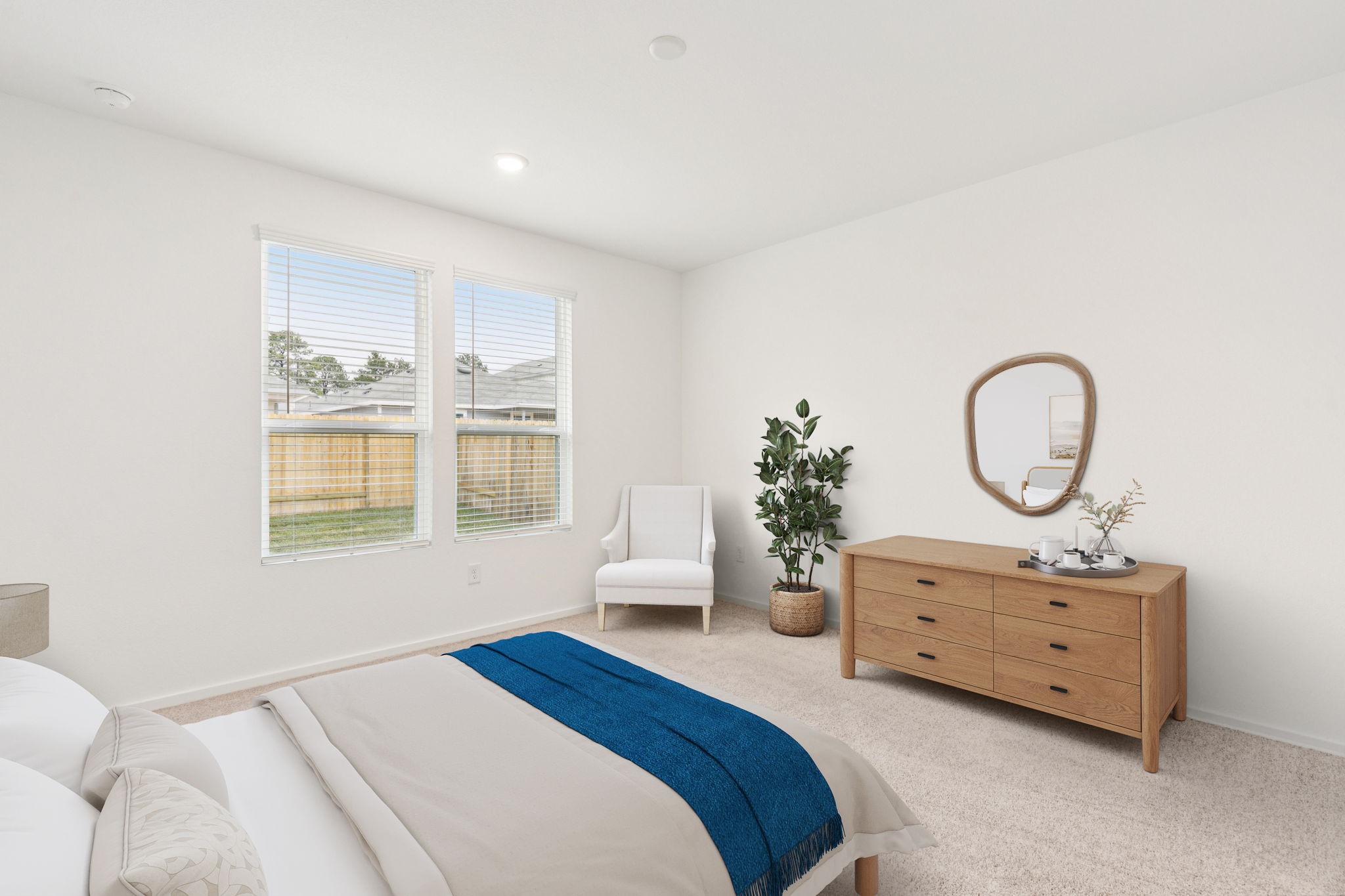 26279 Arrowleaf Drive Magnolia, TX 77355 - Photo 18 of 35 a bedroom with a bed and a potted plant
