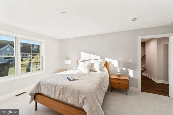 a view of a room with racks on the wall
