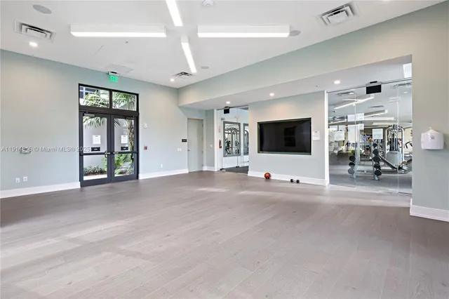 a view of a room with gym equipment