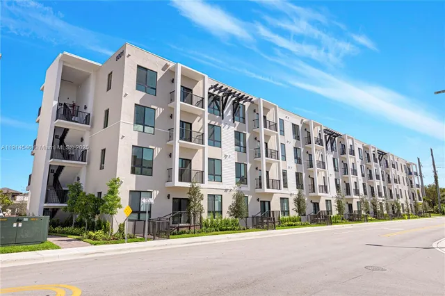 a view of a building with a street